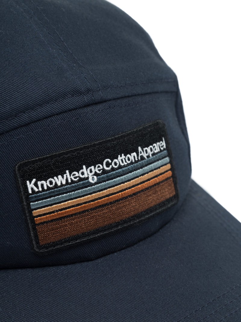 KnowledgeCotton Apparel - UNI Backley cap with badge Caps 1001 Total Eclipse